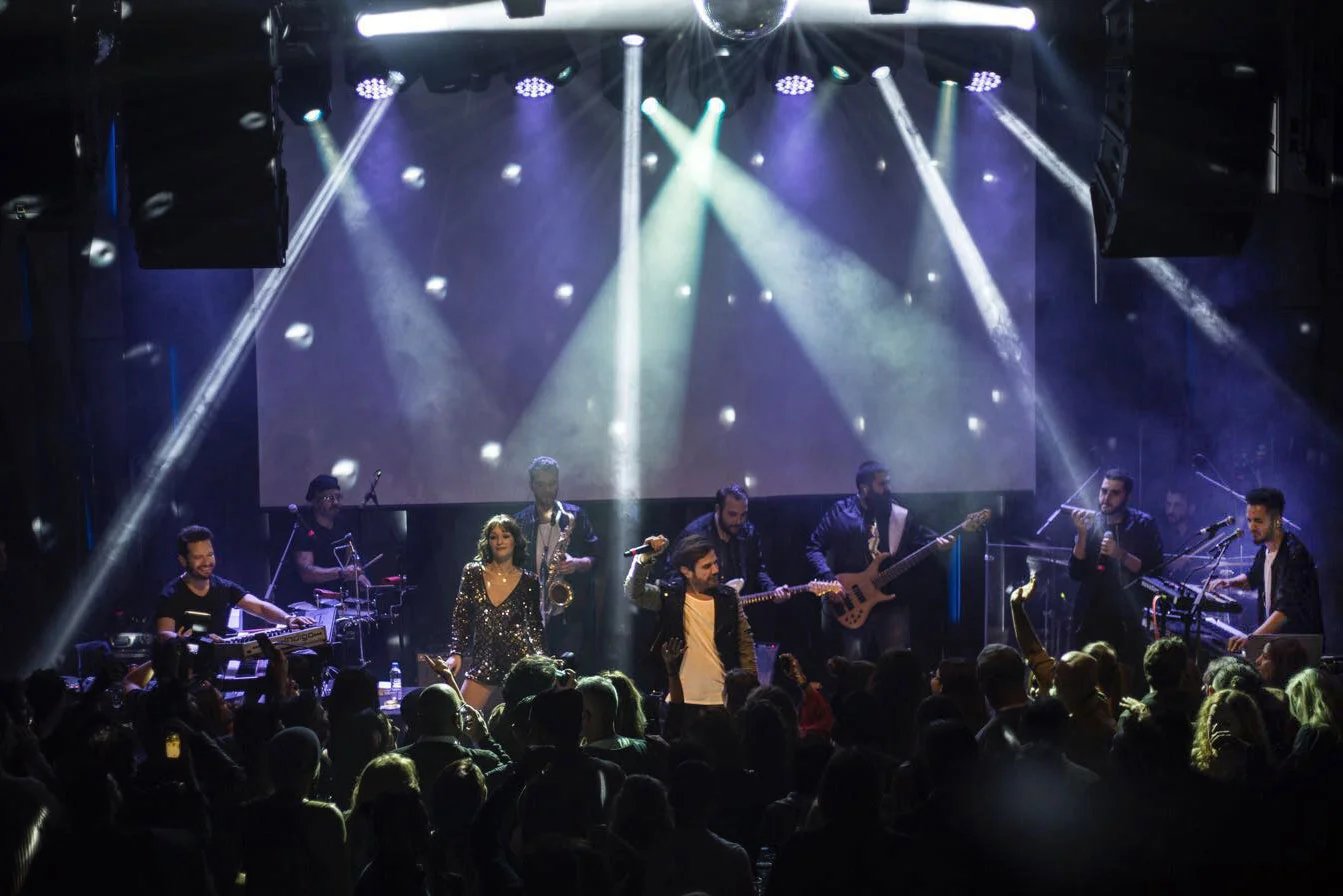 Umut Erhan on stage with keyboard rig